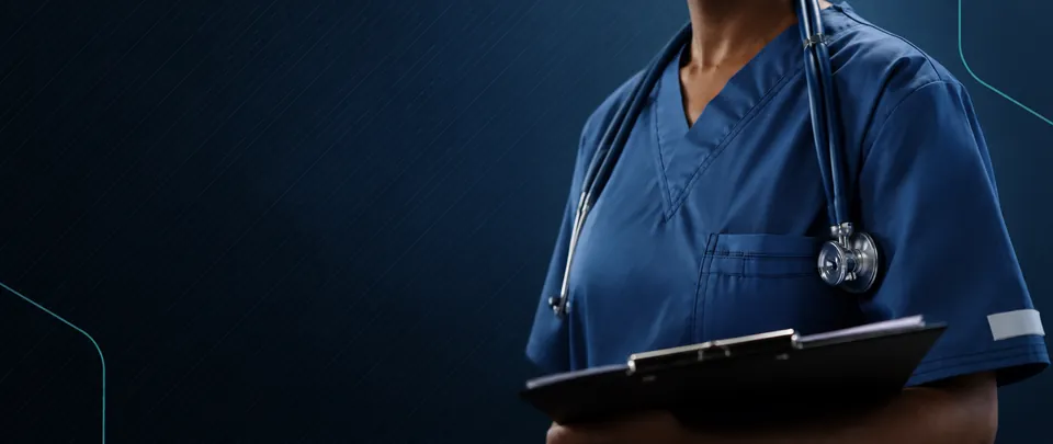 Centrolab medical professional in blue scrubs holding a clipboard