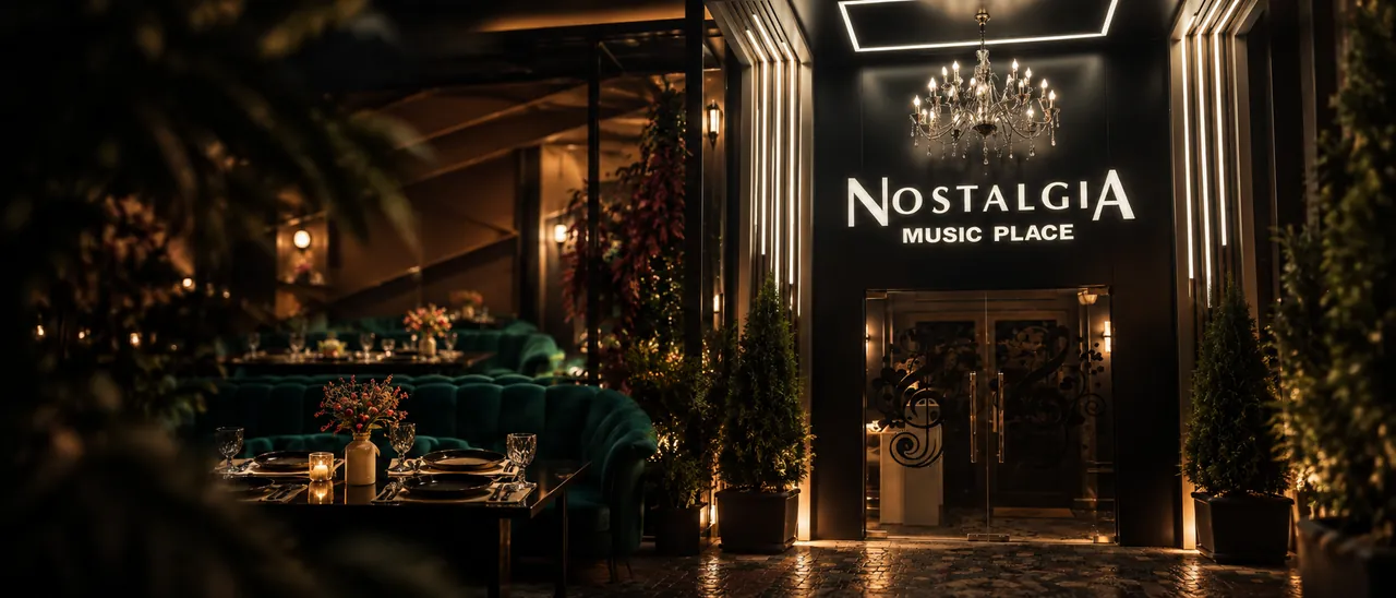 Nostalgia Music Place entrance with chandelier and illuminated sign at night